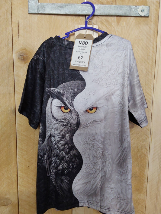 Black and white owl 7-8 yrs